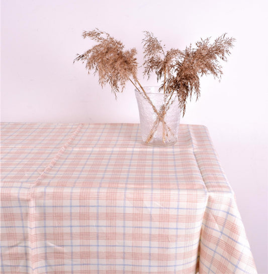 Offwhite linen tablecloth in blue-brown checks