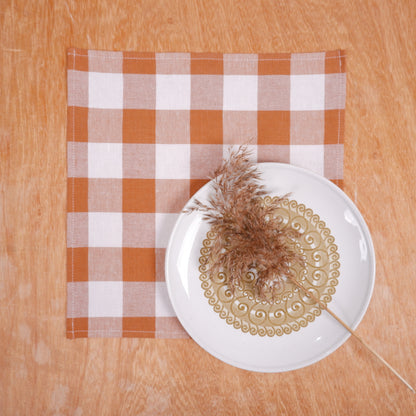 White - brown napkins in gingham checks