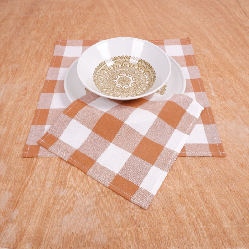 White - brown napkins in gingham checks