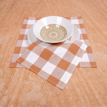 White - brown napkins in gingham checks