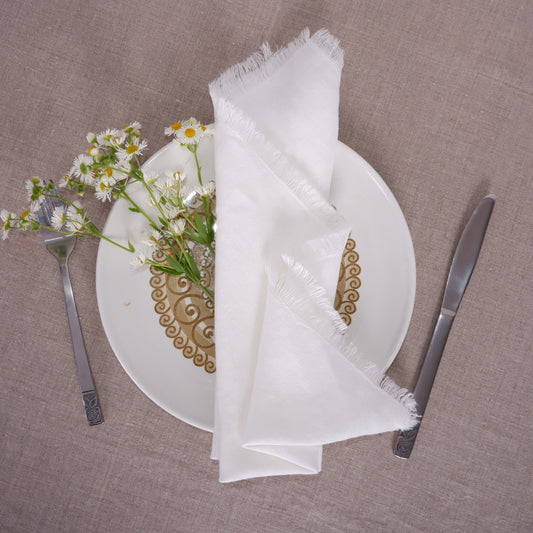 Offwhite linen napkin - frayed edges